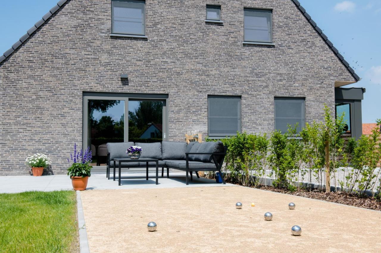 Coq au lit: Maison d'étoile De Haan Exterior foto